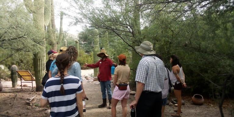 The the Cooper Team on a guided tour at Tucson Botanical Gardens with Adam Farrell-Wortman, Director of Horticulture