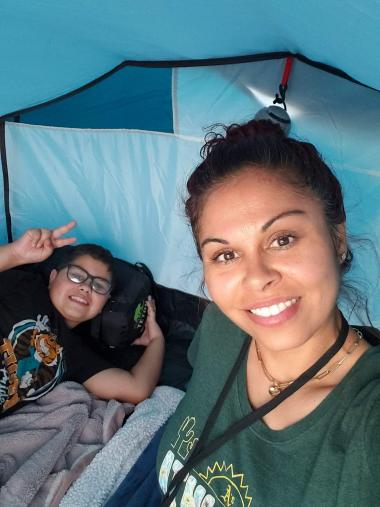 monica montano with her son in a tent overnight at campcooper