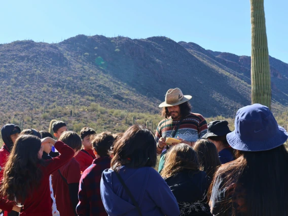 cooper center staff speaking to children outdoors